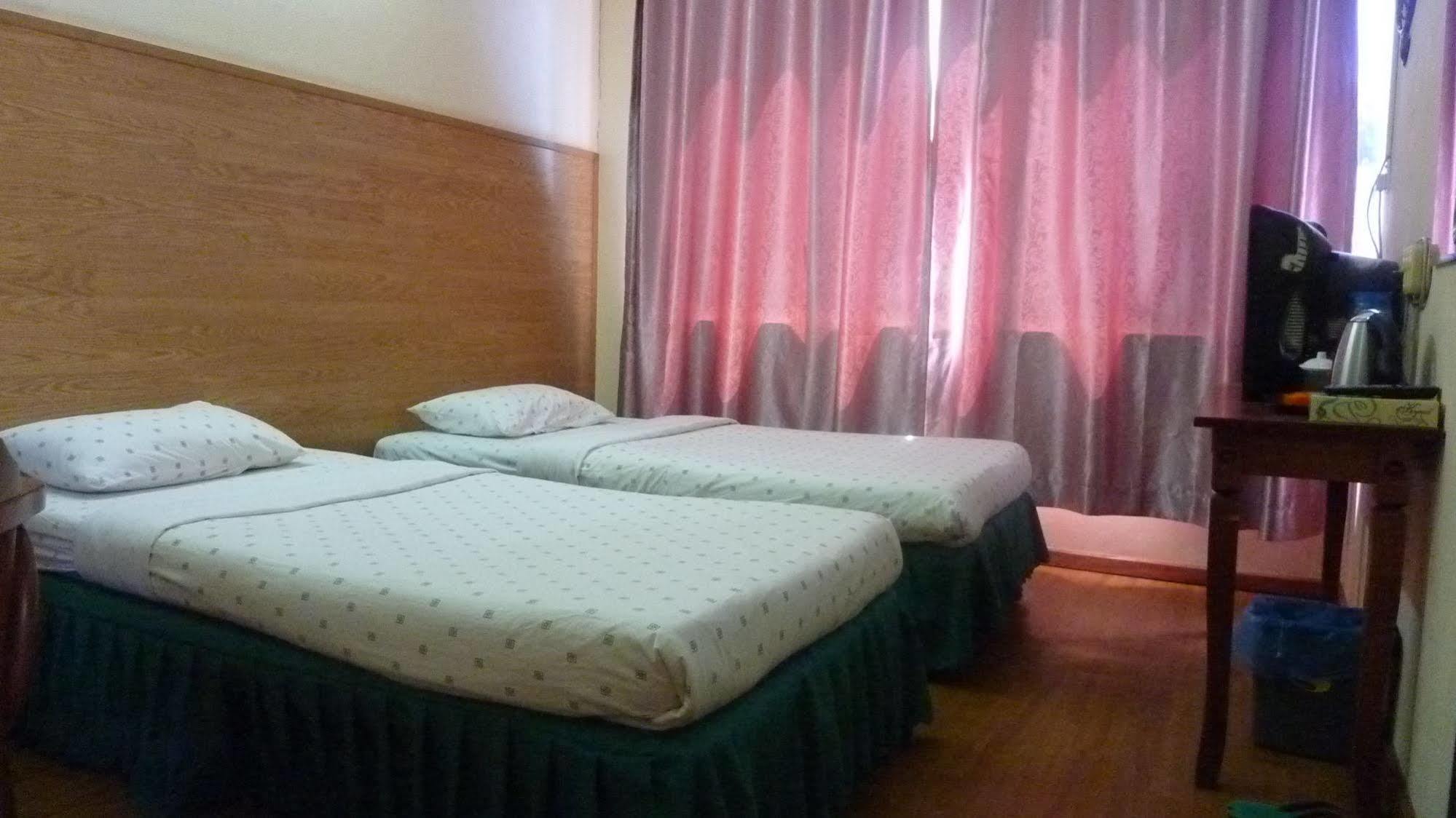 7 Hung Hung Inn Kota Kinabalu Exterior foto